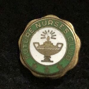 ￼vintage Future Nurses Club lapel pin